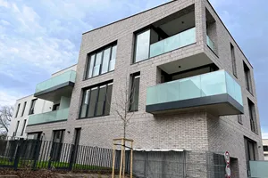 A new-build apartment building before the end of the developer's warranty period